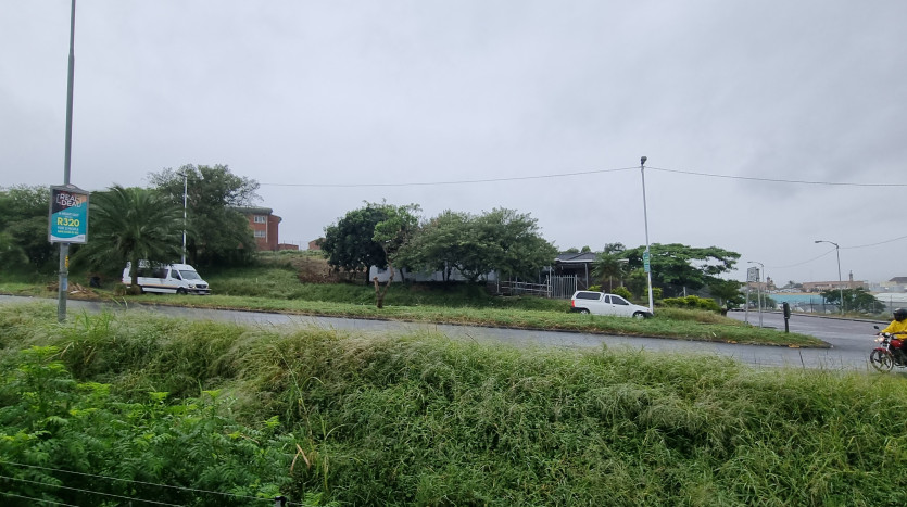 Prime Property Alongside Bustling Highway Property Images