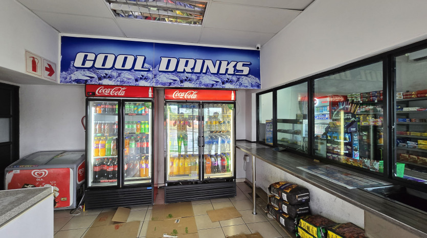 Service Station Within Busy Residential Suburb Property Images